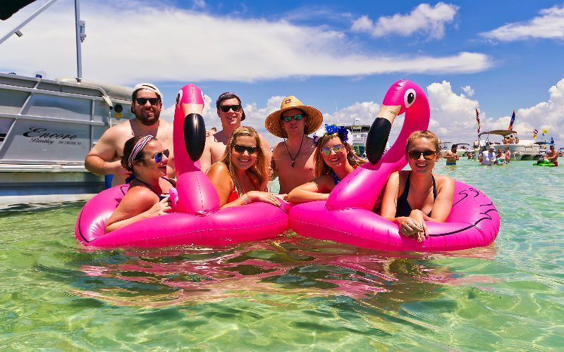 friends partying at crab island sandbar destin florida