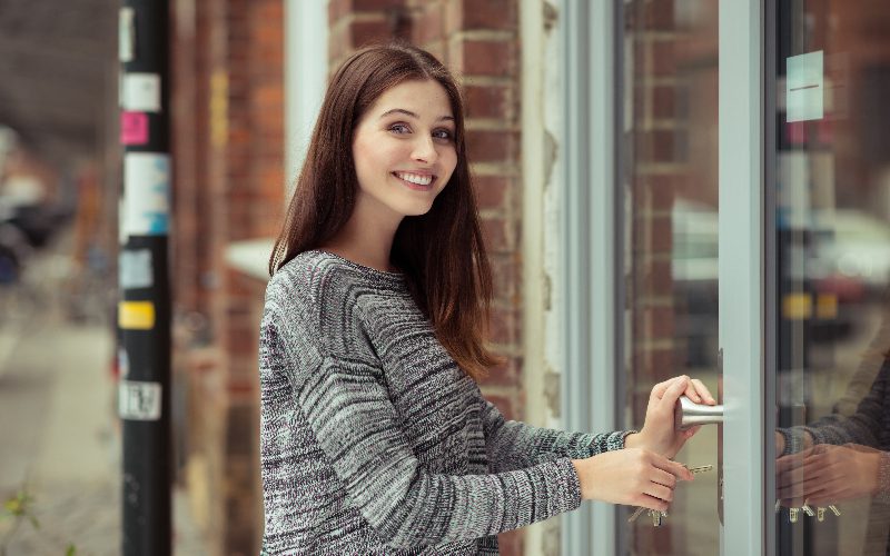 woman-opening-shop